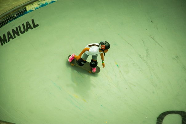 Skate boarding in a bowl